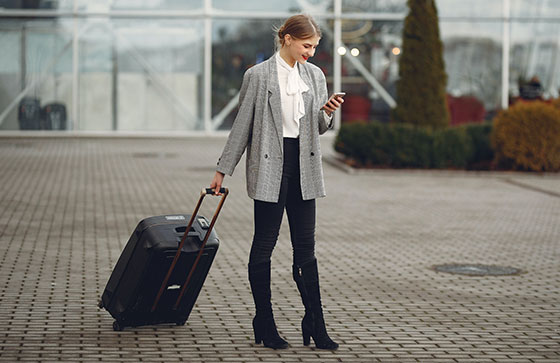 girl waiting for her airport transportation