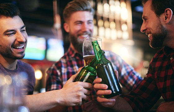 friends drinking in a bar